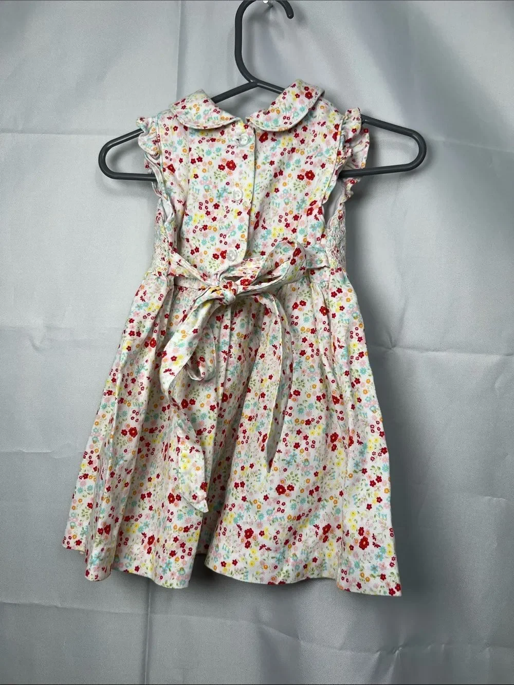 Laura Ashley Floral smocked dress with rose embroidery pink and white 9 months